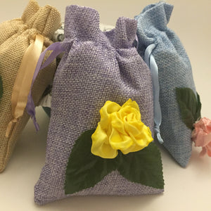 Purple linen bag with yellow rose